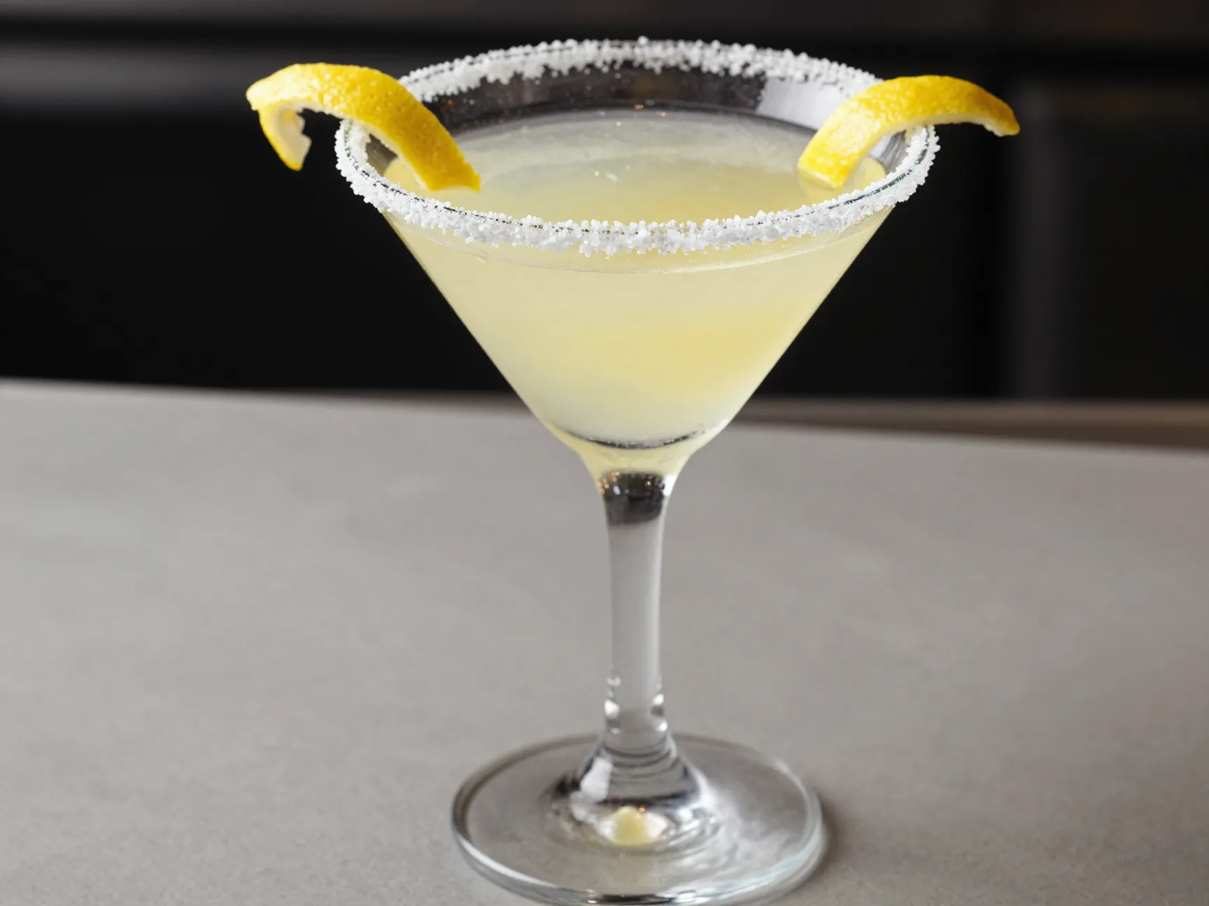 Lemon drop martini mocktail in sugared rim chilled glass