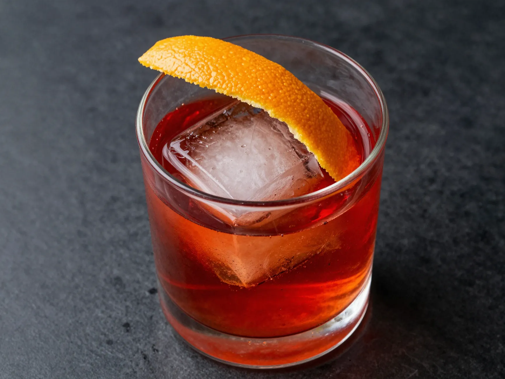 Stirred negroni with orange peel garnish