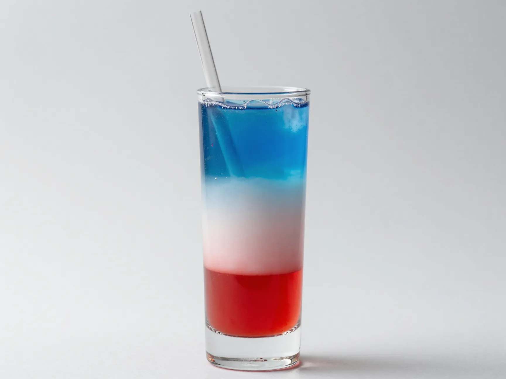Patriotic layered mocktail grenadine sports drink clear straw