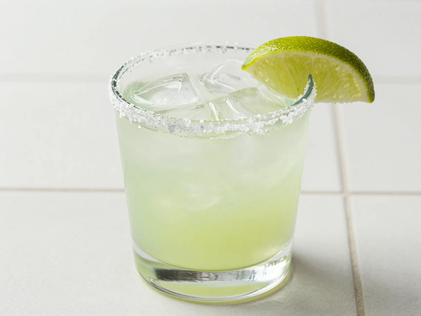 Virgin margarita salt rim lime wheel garnish