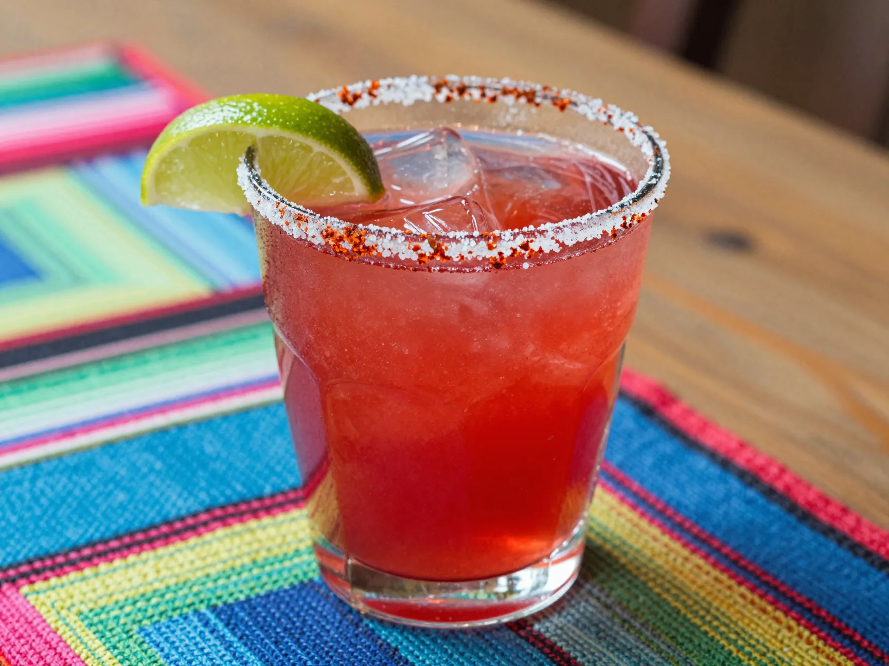 Sparkling cranberry ginger margarita in salted rim glass