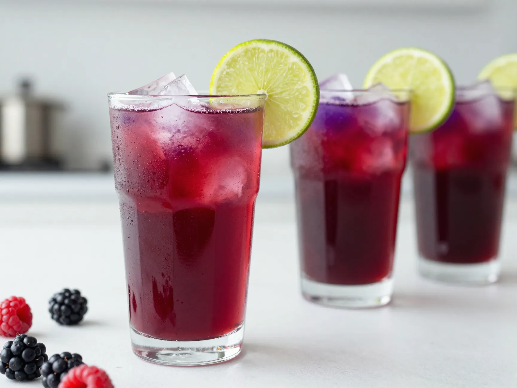 Raspberry blackberry lime dr pepper tart fruit layered vibrant drink